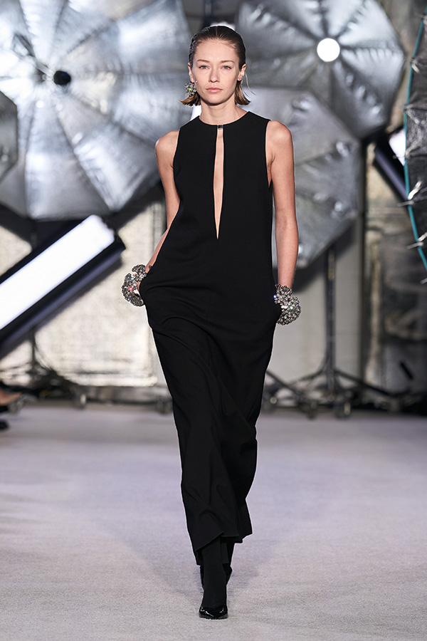 Model in a black jumpsuit