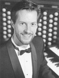 Black and white portrait of Andrew Risinger